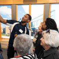 Guests taking a selfie with Lynn Blue at the Lynn M. Blue Connection Naming Ceremony